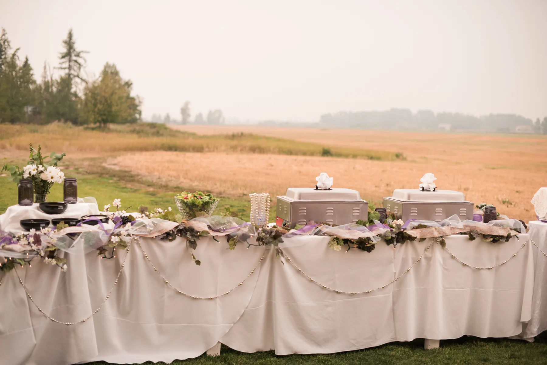 An outdoor wedding buffet overlooking the Flathead Valley