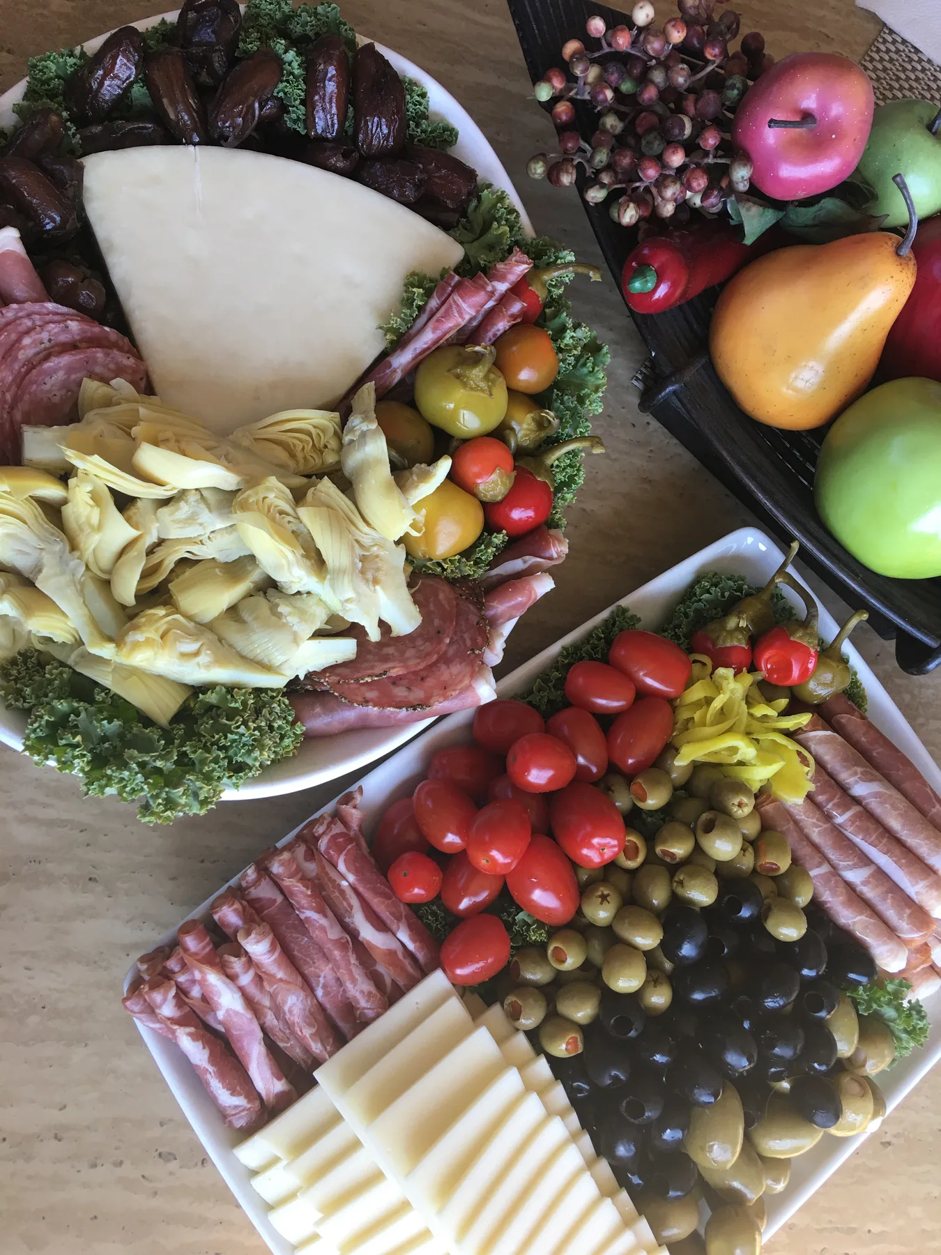 Colorful charcuterie with cheese, cured meats, fruit and vegetables
